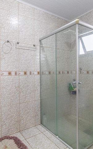 Casa à venda com 300m², 4 quartos e 2 vagasBanheiro da Suíte