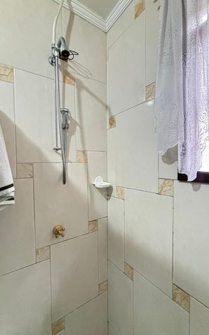 Casa à venda com 194m², 3 quartos e 2 vagas Casa à venda com 194m², 3 quartos e 2 vagasBanheiro da Suíte