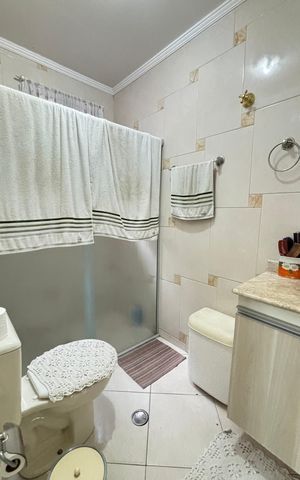 Casa à venda com 194m², 3 quartos e 2 vagas Casa à venda com 194m², 3 quartos e 2 vagasBanheiro da Suíte