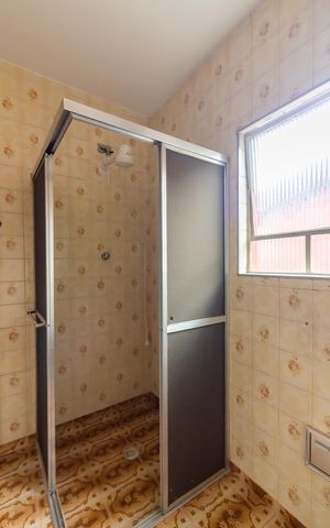 Casa à venda com 212m², 4 quartos e 2 vagas Casa à venda com 212m², 4 quartos e 2 vagasBanheiro 2