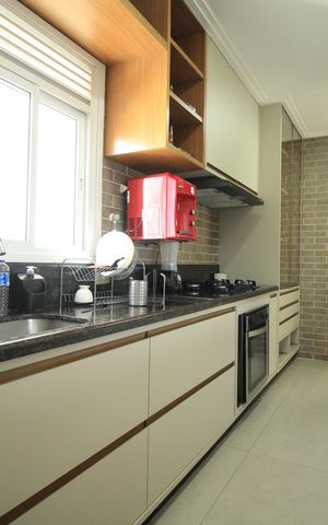 Apartamento para alugar com 140m², 4 quartos e 2 vagas Apartamento para alugar com 140m², 4 quartos e 2 vagasCozinha e Área de Serviço