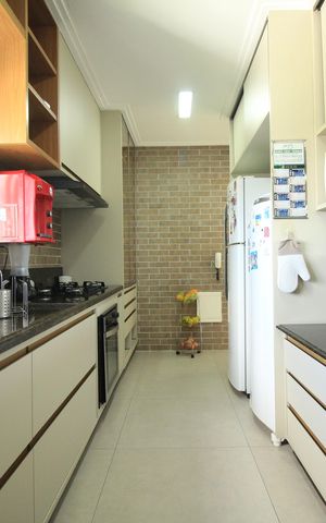 Apartamento para alugar com 140m², 4 quartos e 2 vagas Apartamento para alugar com 140m², 4 quartos e 2 vagasCozinha e Área de Serviço