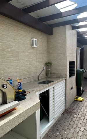 Casa de condomínio à venda com 130m², 3 quartos e 2 vagasÁrea comum - Churrasqueira