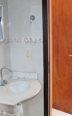Casa de condomínio para alugar com 120m², 3 quartos e 2 vagasBanheiro da Suíte 1