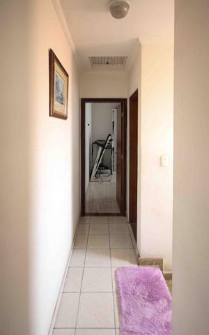 Casa à venda com 138m², 3 quartos e 2 vagas Casa à venda com 138m², 3 quartos e 2 vagasCorredor