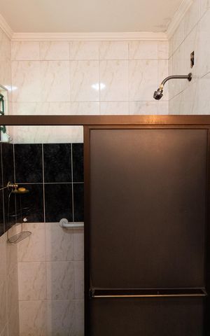Casa à venda com 390m², 4 quartos e sem vaga Casa à venda com 390m², 4 quartos e sem vagaBanheiro da Suíte