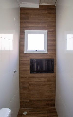 Casa à venda com 130m², 2 quartos e 2 vagasBanheiro da Suíte 2