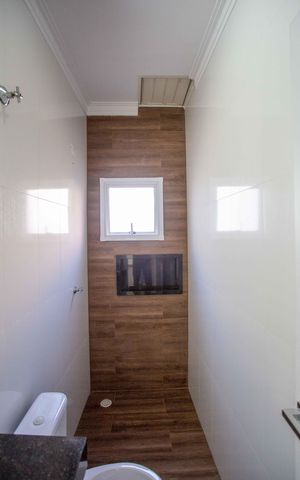 Casa à venda com 130m², 2 quartos e 2 vagasBanheiro da Suíte 2
