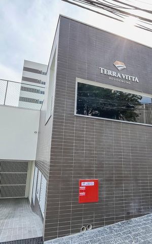 Apartamento à venda com 68m², 2 quartos e 2 vagasFachada + Placa