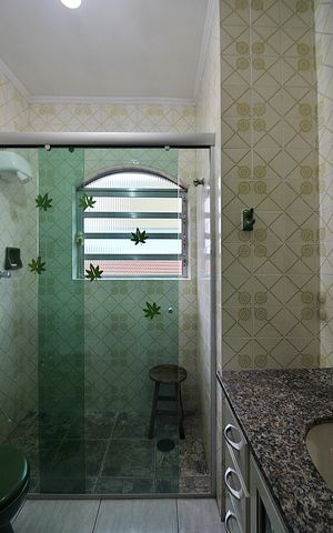 Casa à venda com 220m², 4 quartos e 2 vagasSuíte Banheiro