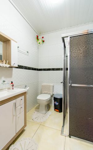 Casa à venda com 138m², 5 quartos e 2 vagas Casa à venda com 138m², 5 quartos e 2 vagasBanheiro