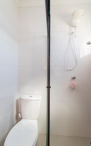 Casa à venda com 130m², 3 quartos e 4 vagasBanheiro da Suíte 1