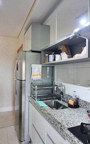 Apartamento à venda com 77m², 2 quartos e 2 vagasCozinha e Área de Serviço