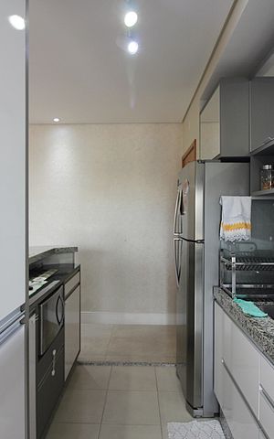Apartamento à venda com 77m², 2 quartos e 2 vagasCozinha e Área de Serviço