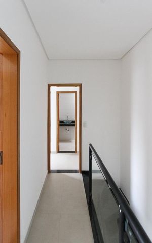 Casa à venda com 95m², 3 quartos e 3 vagas Casa à venda com 95m², 3 quartos e 3 vagasCorredor