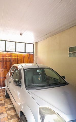 Casa à venda com 273m², 3 quartos e 1 vaga Casa à venda com 273m², 3 quartos e 1 vagaGaragem