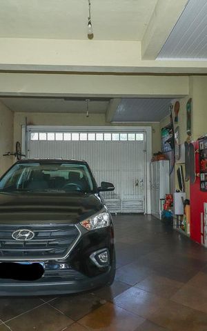 Casa à venda com 278m², 4 quartos e 4 vagasGaragem