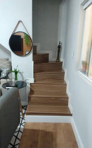 Casa à venda com 135m², 2 quartos e 2 vagas Casa à venda com 135m², 2 quartos e 2 vagasSala