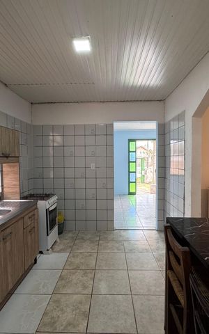Casa à venda com 130m², 3 quartos e 1 vaga Casa à venda com 130m², 3 quartos e 1 vagaCozinha