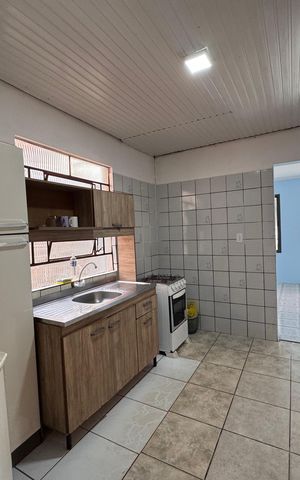 Casa à venda com 130m², 3 quartos e 1 vaga Casa à venda com 130m², 3 quartos e 1 vagaCozinha