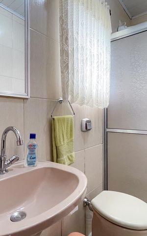 Casa à venda com 170m², 4 quartos e 2 vagas Casa à venda com 170m², 4 quartos e 2 vagasBanheiro Social 1