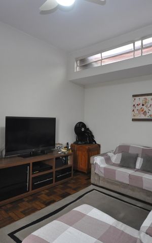 Casa à venda com 160m², 3 quartos e 2 vagasSala de TV