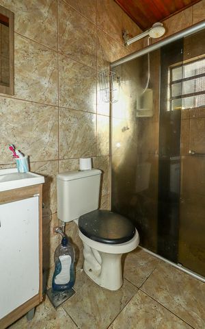 Casa à venda com 200m², 3 quartos e 2 vagasBanheiro