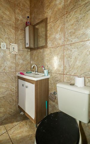 Casa à venda com 200m², 3 quartos e 2 vagasBanheiro
