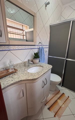 Casa à venda com 110m², 3 quartos e 3 vagas Casa à venda com 110m², 3 quartos e 3 vagasBanheiro 2
