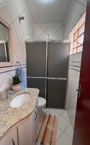 Casa à venda com 110m², 3 quartos e 3 vagas Casa à venda com 110m², 3 quartos e 3 vagasBanheiro 2