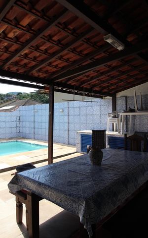 Casa de condomínio à venda com 273m², 4 quartos e 4 vagasÁrea Externa - Fundos