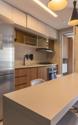 Apartamento à venda com 120m², 3 quartos e 2 vagas Apartamento à venda com 120m², 3 quartos e 2 vagasCozinha e Área de Serviço