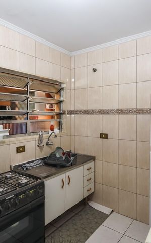 Casa à venda com 90m², 3 quartos e 2 vagas Casa à venda com 90m², 3 quartos e 2 vagasCozinha