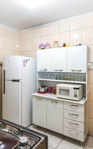 Casa à venda com 90m², 3 quartos e 2 vagas Casa à venda com 90m², 3 quartos e 2 vagasCozinha