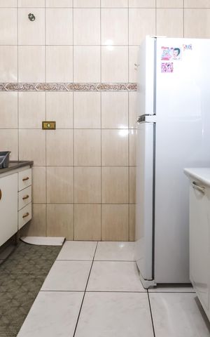 Casa à venda com 90m², 3 quartos e 2 vagas Casa à venda com 90m², 3 quartos e 2 vagasCozinha