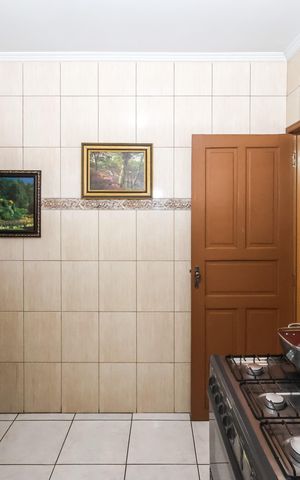 Casa à venda com 90m², 3 quartos e 2 vagas Casa à venda com 90m², 3 quartos e 2 vagasCozinha