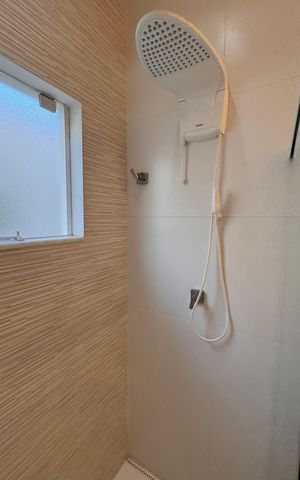 Casa de condomínio à venda com 207m², 3 quartos e 4 vagas Casa de condomínio à venda com 207m², 3 quartos e 4 vagasBanheiro da Suíte 1