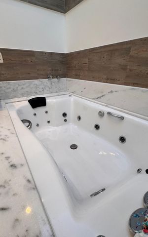 Casa de condomínio à venda com 207m², 3 quartos e 4 vagas Casa de condomínio à venda com 207m², 3 quartos e 4 vagasBanheiro da Suíte 3