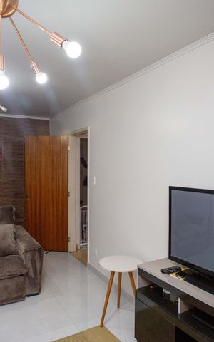 Casa à venda com 135m², 2 quartos e 2 vagasSala