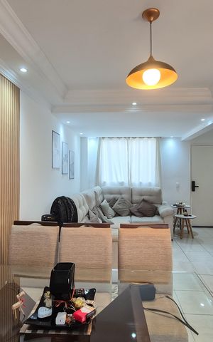 Casa de condomínio à venda com 110m², 3 quartos e 2 vagasSala