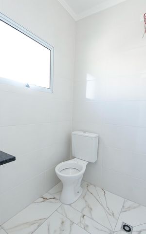 Casa à venda com 120m², 3 quartos e 2 vagas Casa à venda com 120m², 3 quartos e 2 vagasBanheiro Suíte 1