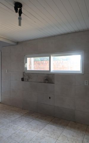 Casa à venda com 60m², 2 quartos e 2 vagasSala/Cozinha