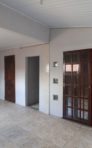 Casa à venda com 60m², 2 quartos e 2 vagasSala/Cozinha