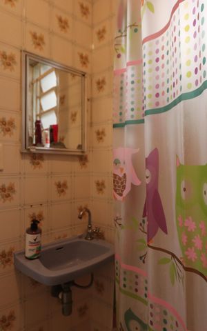 Casa à venda com 320m², 4 quartos e 7 vagasBanheiro de serviço