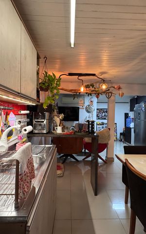 Casa à venda com 80m², 2 quartos e 2 vagas Casa à venda com 80m², 2 quartos e 2 vagasCozinha