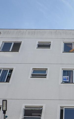 Apartamento à venda com 47m², 2 quartos e 1 vagaFachada do bloco e placa