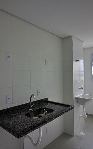 Apartamento para alugar com 48m², 2 quartos e 1 vagaCozinha e Área de Serviço