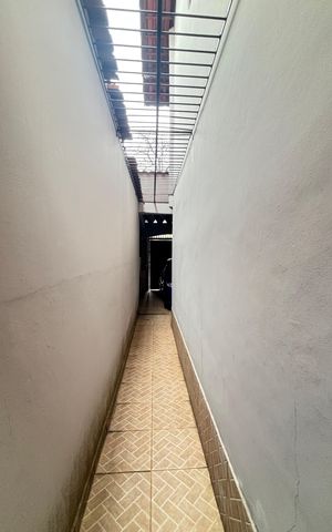 Casa à venda com 255m², 4 quartos e 3 vagas Casa à venda com 255m², 4 quartos e 3 vagasCorredor Externo