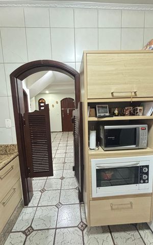 Casa à venda com 255m², 4 quartos e 3 vagas Casa à venda com 255m², 4 quartos e 3 vagasCozinha