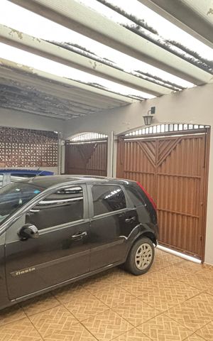 Casa à venda com 255m², 4 quartos e 3 vagas Casa à venda com 255m², 4 quartos e 3 vagasGaragem